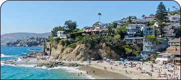A scenic photo of Laguna Beach`s coastline, with an explanation of the luxury car service from John Wayne Airport to the area.